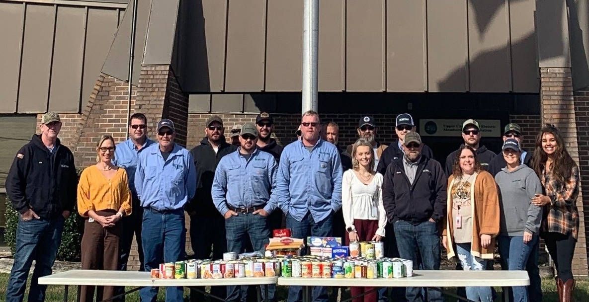 UCEMC Food Drive with proud employees